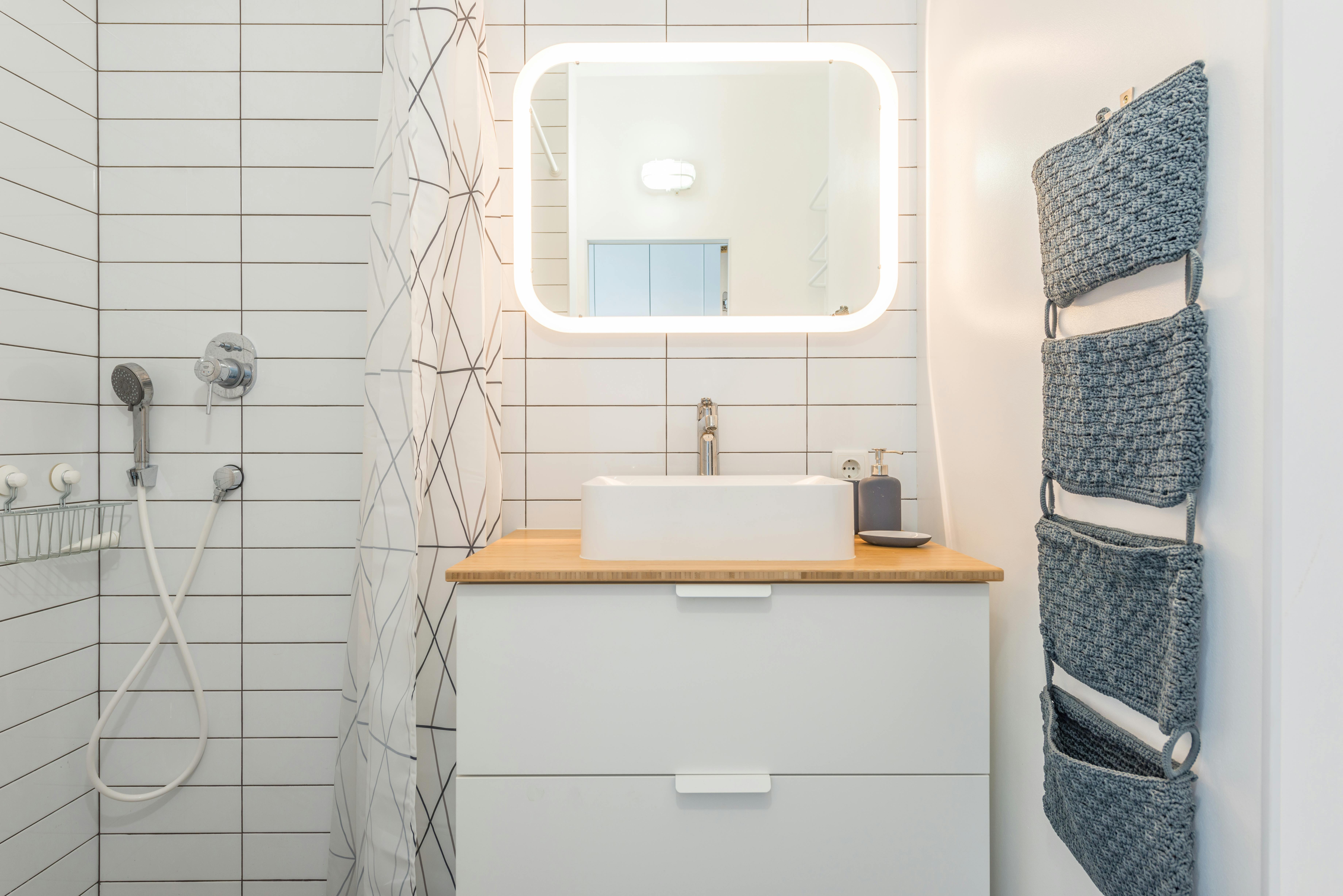 Organized bathroom cabinet with clear containers