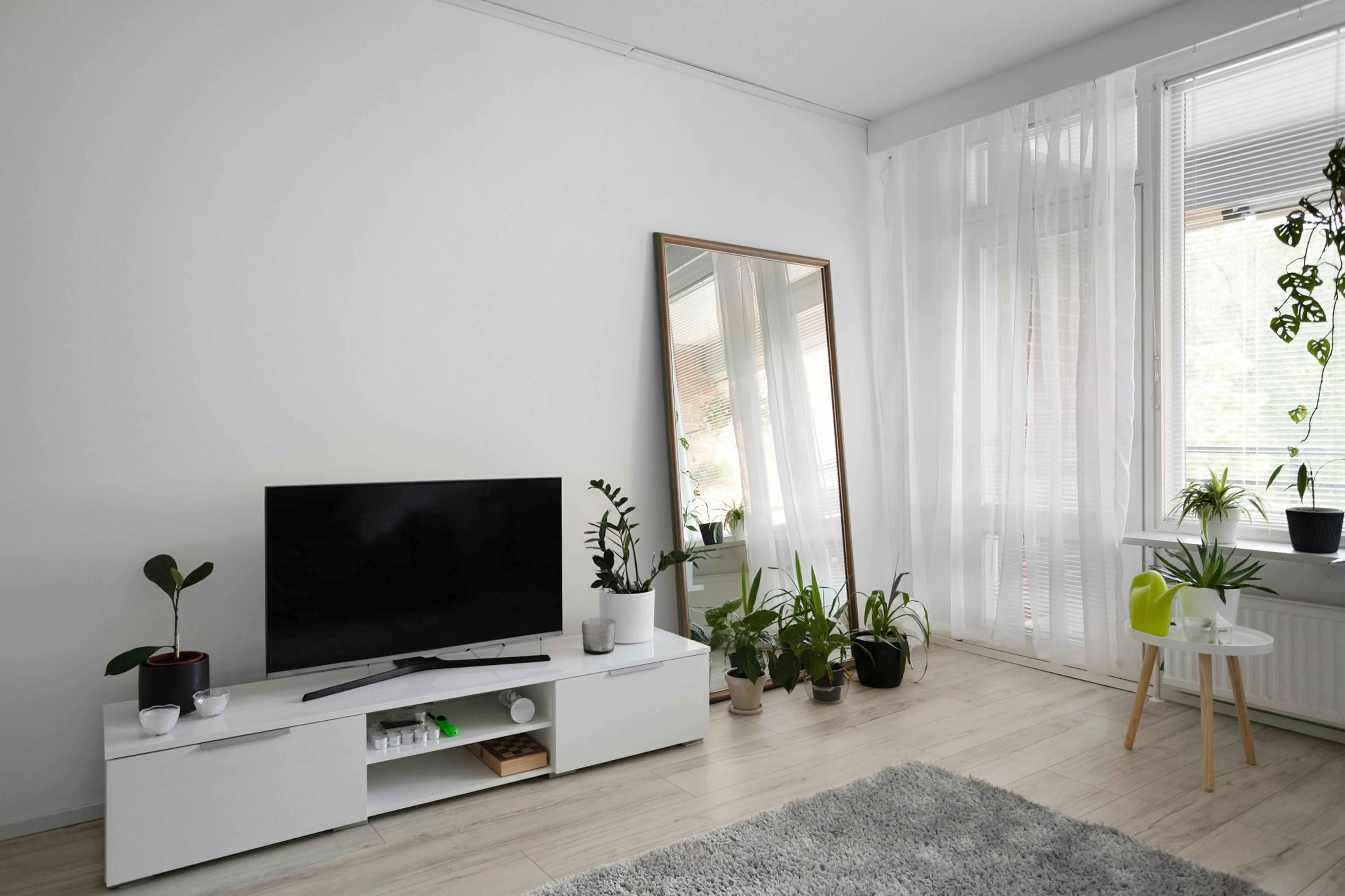 Bookcase used as a room divider with storage
